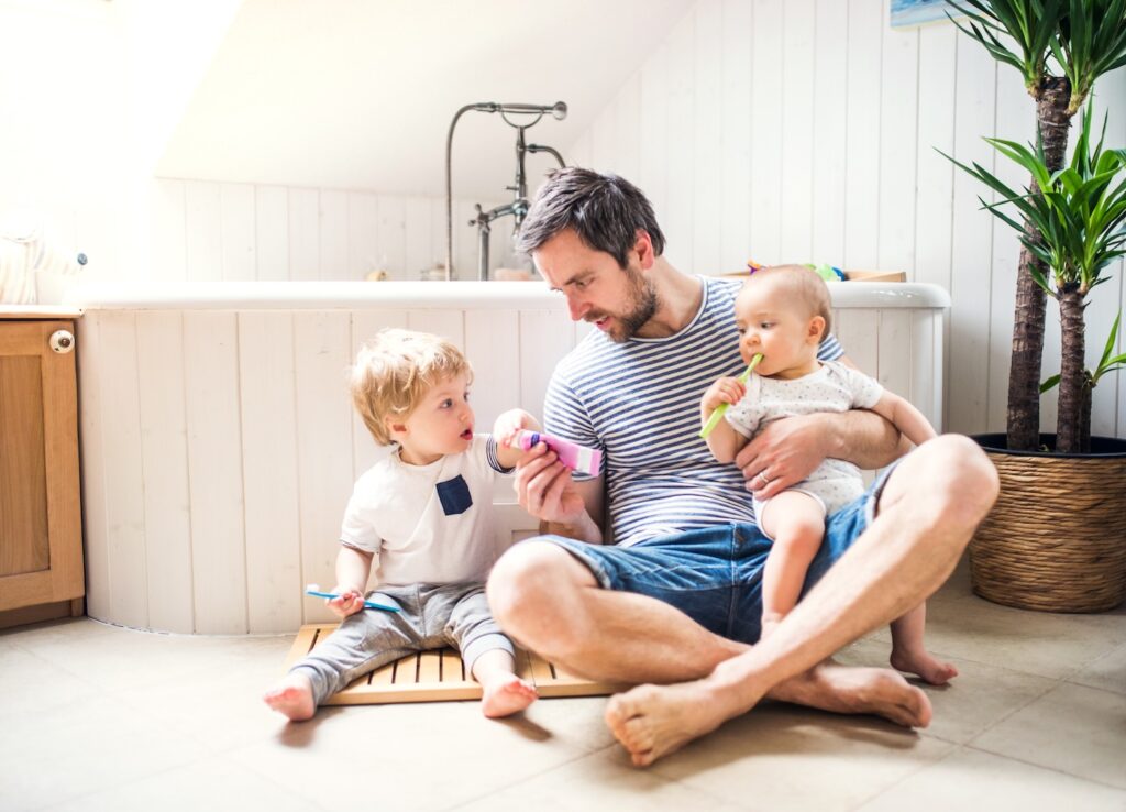 family on bathroom floor